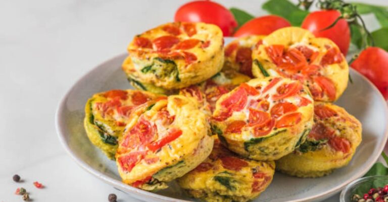 Muffin-shaped egg bites with tomatoes and herbs